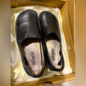 Alegria black clogs